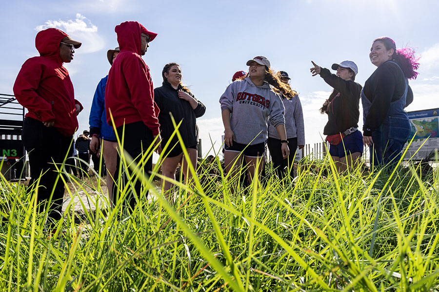 Students awaiting planting instructions for the shoreline at Elmer's Island, Lousiana.